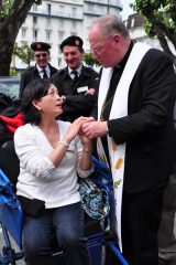 2011 Lourdes Pilgrimage - Archbishop Dolan with Malades (253/267)